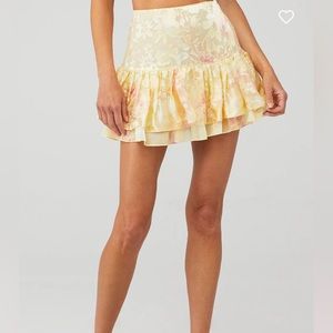 - Love Shack Fancy Tevy Skirt in Yellow Melon